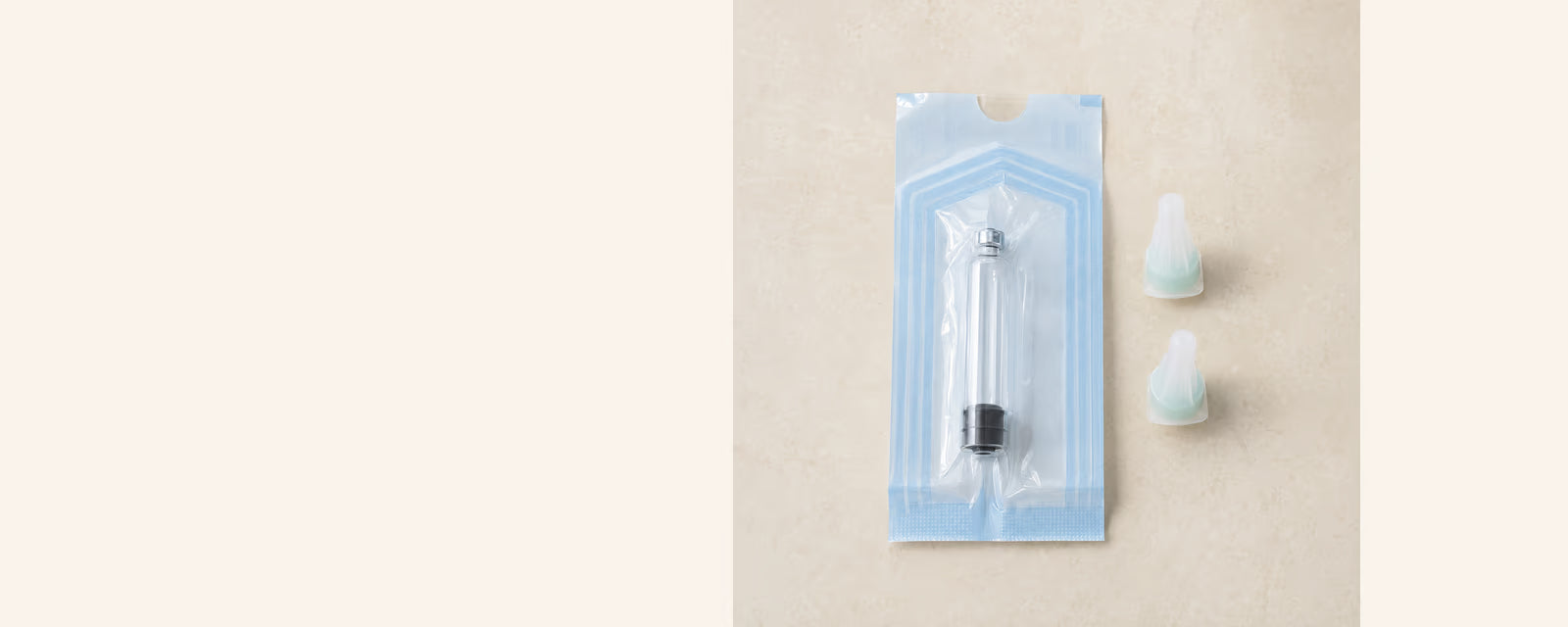 Sealed empty-cartridge package beside capped pen-tip units